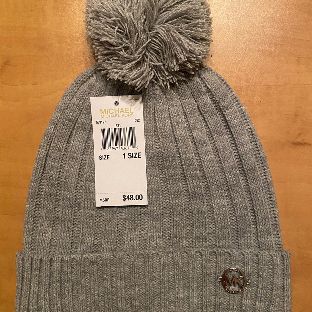 Brand new with tags Michael Kors Woman’s Beanie hat.